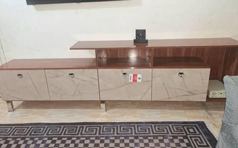 TV Console for sell, just like New. . .