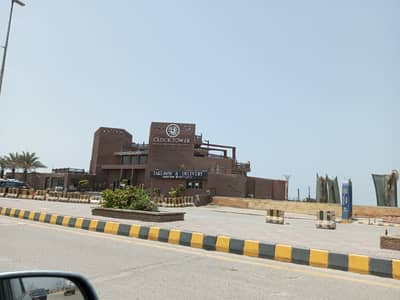 100 Sq Yards Commercial plot, in Sahil Commercial, near Parking, DHA Phase-7 Ext. .