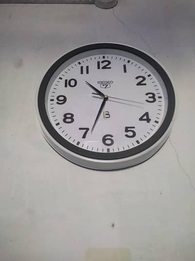 white wall clock