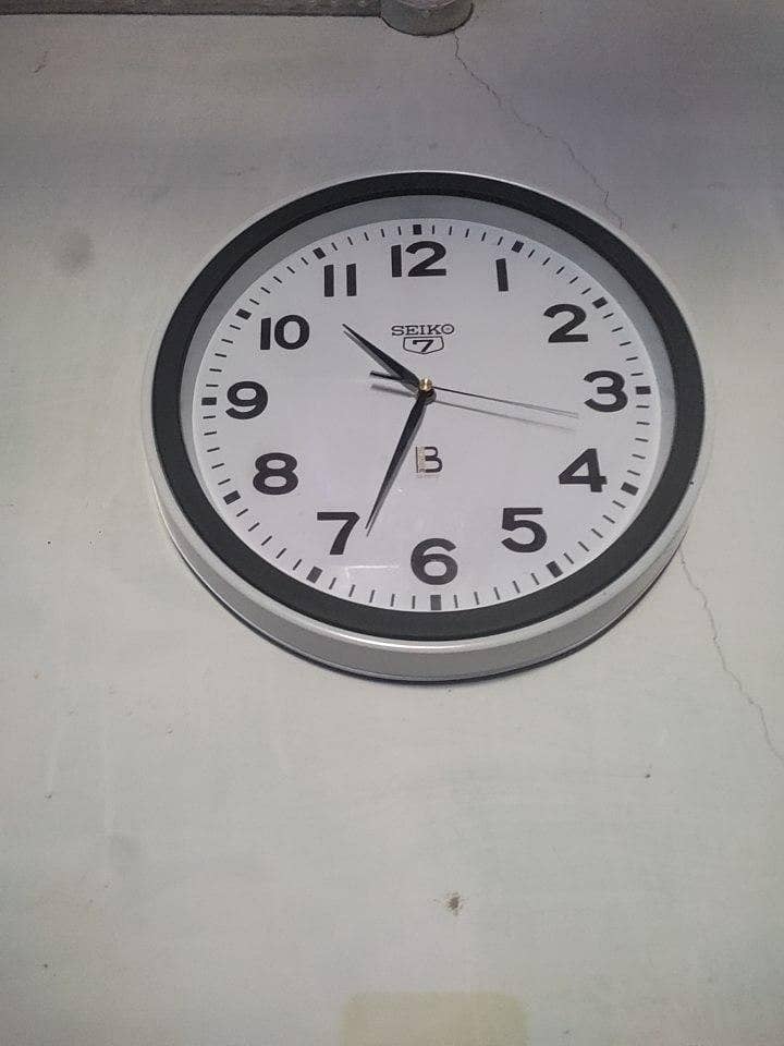 white wall clock 0