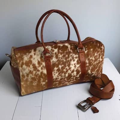 Travel bag Natural cow hair on leather