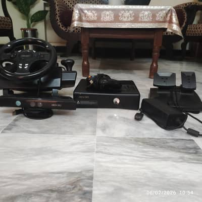 Xbox 360 with steering wheel and Kinect