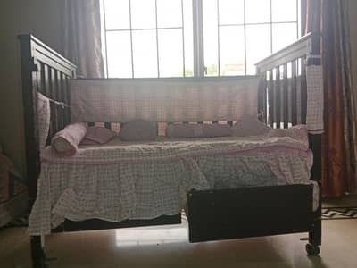 baby cot and bed