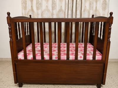 Custom designed wooden cot with mattress. Contact on 03373195090.
