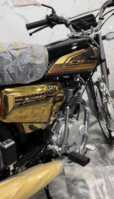 125 new edition gold black