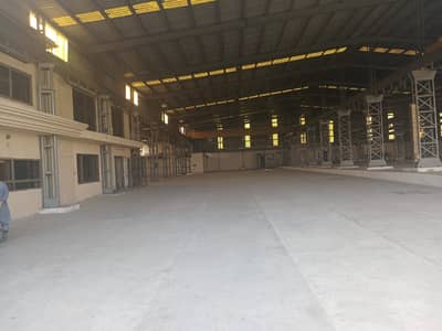 I-9 WAREHOUSE 25000 SQUARE FEET GOOD HEIGHT BEST LOCATION NEAR TO DRY PORT SEPARATE GATE FOR IN & OUT PARKING SPACE FOR LONG VEHICLES