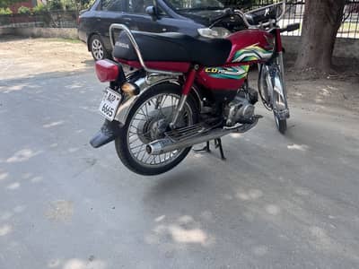 Honda cd 70 2023 model red color