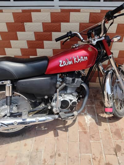 Red Honda 125 for sale