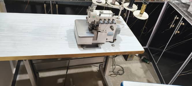 Two (2) pico and overlock machines . . . Excellent condition