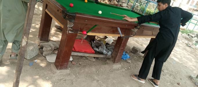 snooker table and hand ball game