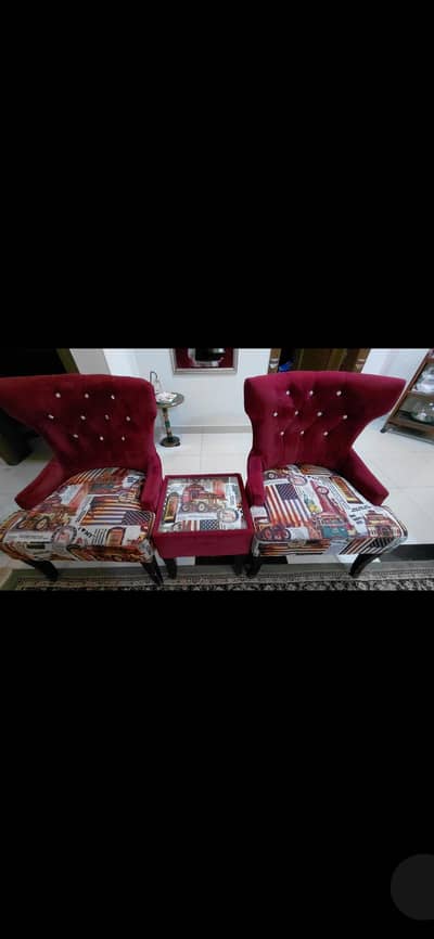 2 chairs with table