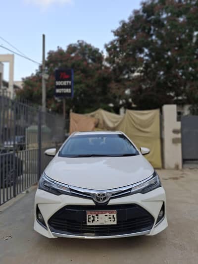 Toyota Altis Grande White with black 2022