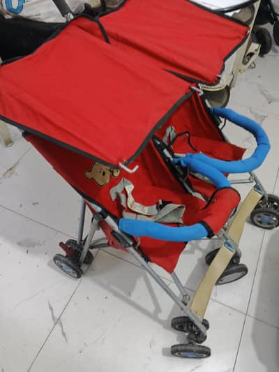 Twin pram for sale
