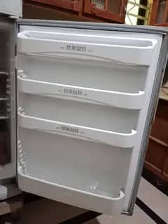 A full size double door Dawlance refrigerator in perfect condition,