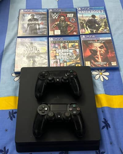 PS4 Slim + 2 Controllers + 6 Games | Excellent Condition | Rs. 75,000