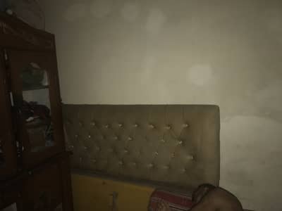 Bed and showcase