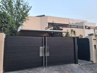 22 Marla Used Modern Design Most Beautiful Fully Furnished Bungalow 15 KV Solar Attached With Net Metering All ACs Attached For Sale At Prime Location Of DHA Lahore Near To Park Masjid & Commercial Market