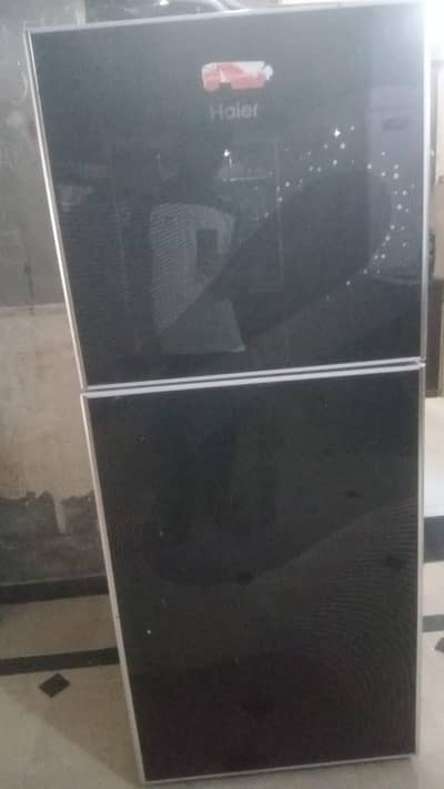haire front glass full size refrigerator for sale 40 k only contact on