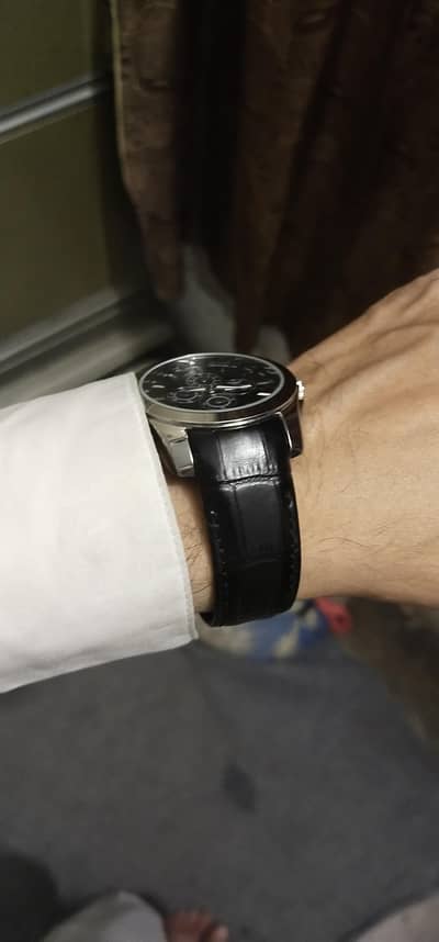 Tissot 1853 day date function dark glow light needles cndishn like new