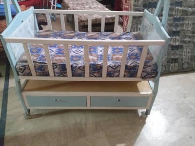 wooden baby cot with storage