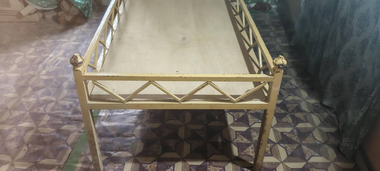 single iron bed 2