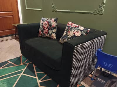 2 seater sofa deep green color