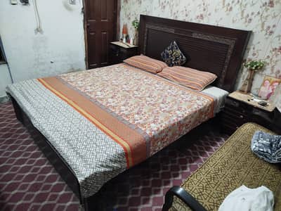 wooden double bed two side tables one dressing table