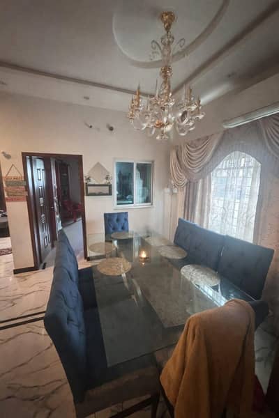 dining table solid base and glass top with 8 chairs