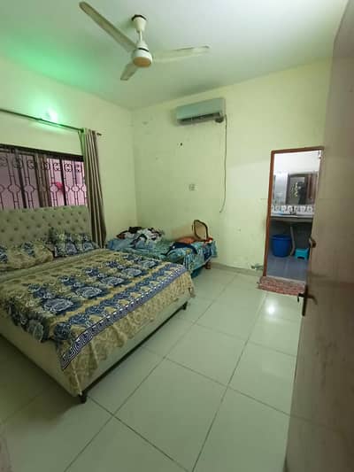 Facing Park 7 Marla Double-Story House for Sale in Model Town Extension, Lahore