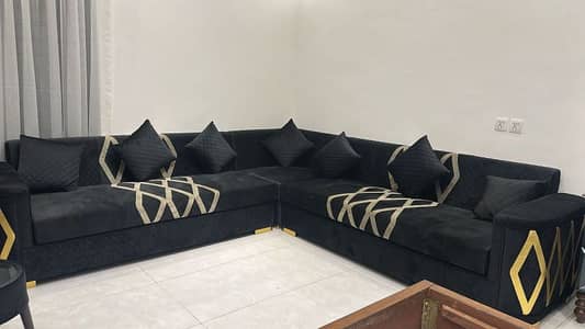 black L shaped sofa