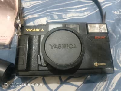 Vintage yashica camera with timer and 6 rolls of film