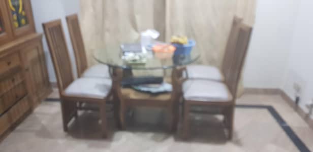 4 seat round dining table in solid wood