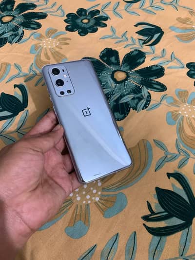 One Plus 9 Pro 12 256 neat coundition