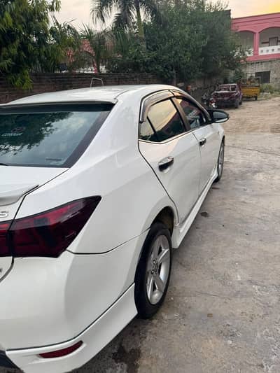 Toyota corolla altis grande 2014 excellent condition urgent sale