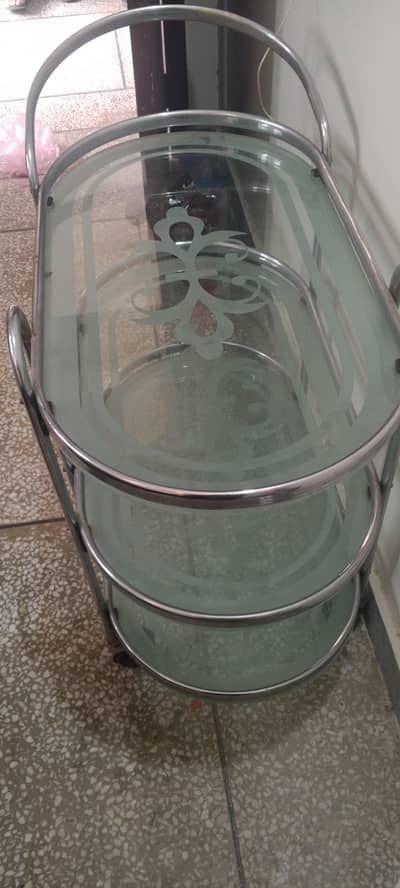 solid steel body tea trolly in good condition is for sale in less