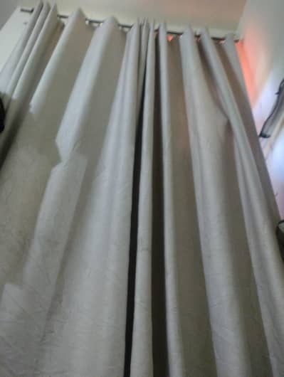 beige coloured curtains