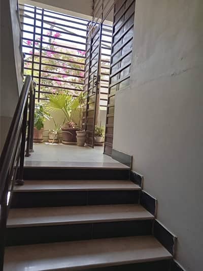 This beautiful 3 bedroom, first floor portion spans 200 square yards and is located in the highly desirable Block 3 A