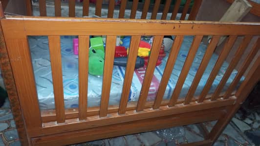 baby cot for sale in reasonable price made with solid wood