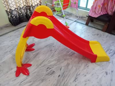 Kids Swing and Slide for Sale. 9/10 Condition. Slightly used.