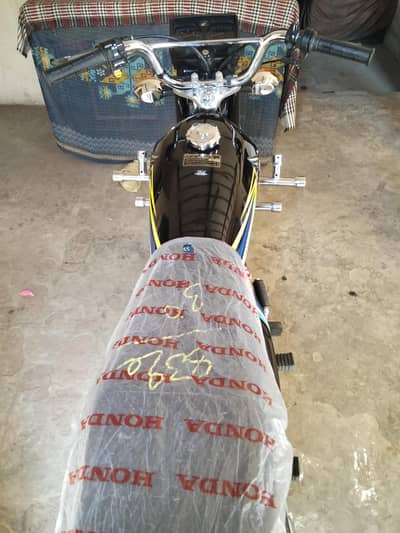 Honda 125 first owner colour black