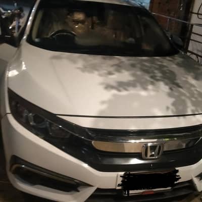 Honda Civic Oriel ug 2017 and ka modal ha  2018 register ha golden num