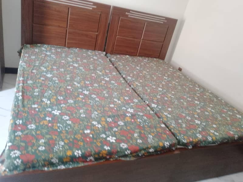 2 SINGLE BEDS 1