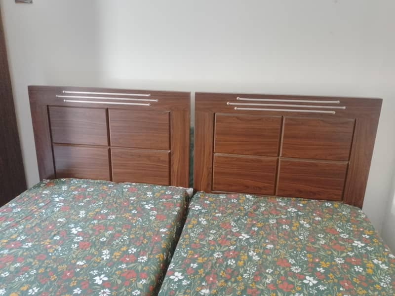 2 SINGLE BEDS 2