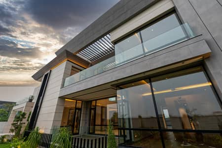 . Exclusive 2 Kanal Designer Residence with 5 Master Bedrooms Prime Location Near Raya
