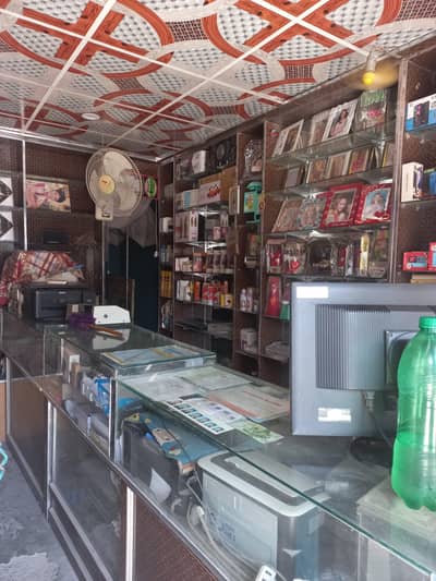 Running Mobile and photostudio /photocopy shop for sale