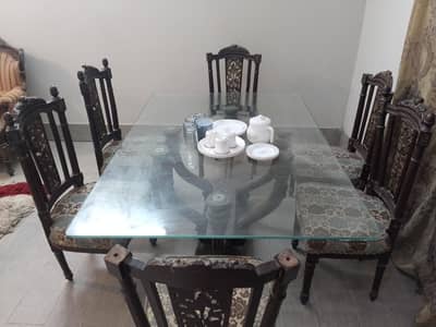 6 seater wooden dinning table (price is negotiable)