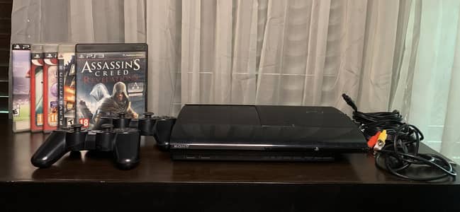 PS3 Super Slim 500GB + 2 Original Controllers + 5 Games