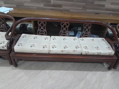 I am selling sofa set in totally wood just buy and take a rest