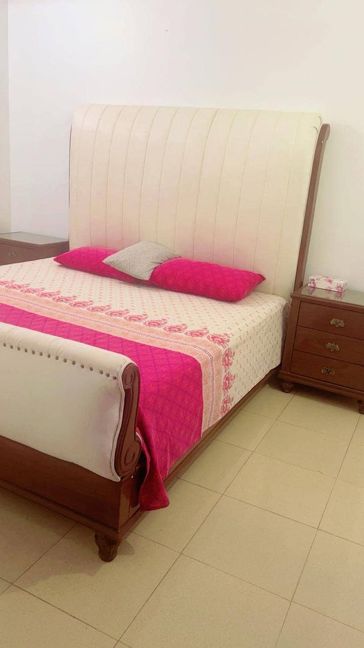 bed with side table 0