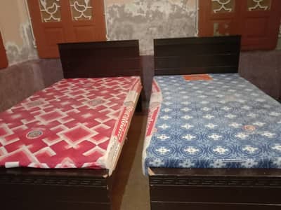 2 single bedswith mattress